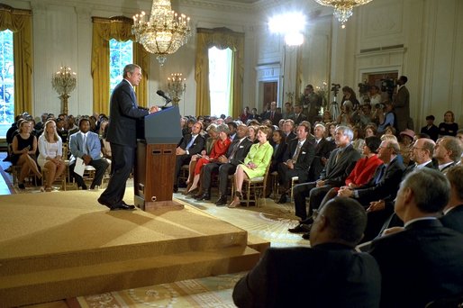 President George W. Bush discusses public education at the White House Conference on Character and Community in the East Room June 19. "I believe that public schools are the most important institutions in democracy," said the President. "And a good education is the birthright of every American child. Every public school must be the pathway to a better life." 