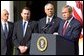 President George W. Bush announces a new Mother and Child HIV Prevention Initiative in the Rose Garden June 19. Standing by the President from, left to right, are Secretary of Treasury Paul O'Neill, Secretary of Health and Human Services Tommy Thompson and Secretary of State Colin Powell. 