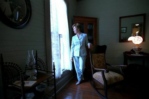 Laura Bush walks with Richard Moe, President of the National Trust for Historic Preservation, after touring Orchard House, the Concord, Mass., home of Louisa May Alcott and her family June 20, 2002. White House photo by Susan Sterner