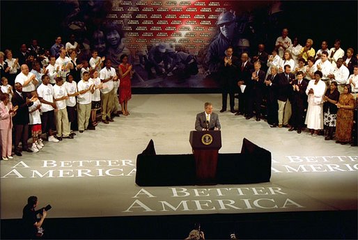 President George W. Bush discusses the compassionate conservative agenda for inner cities at Playhouse Square Center in Cleveland, Ohio, Monday, July 1. "It is conservative to promote private property, and ownership of homes," said the President. "It is compassionate to understand there is an ownership gap in America, and we must use our resources to close that ownership gap by encouraging minority ownership of homes in America." White House photo by Paul Morse.