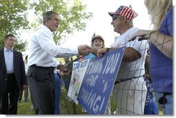 President George W. Bush greets residents of Ripley, West Virginia moments after his arrival on Marine One, July 4. White House photo by Eric Draper.