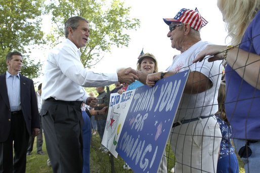 President George W. Bush greets residents of Ripley, West Virginia moments after his arrival on Marine One, July 4. White House photo by Eric Draper.