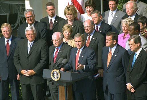 President George W. Bush announces the Homeland Security Strategy as Vice President Cheney and Governor Ridge stand beside the President during a Rose Garden press conference Tuesday, July 16. White House photo by Tina Hager.