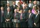 President George W. Bush announces the Homeland Security Strategy as Vice President Cheney and Governor Ridge stand beside the President during a Rose Garden press conference Tuesday, July 16. White House photo by Tina Hager.