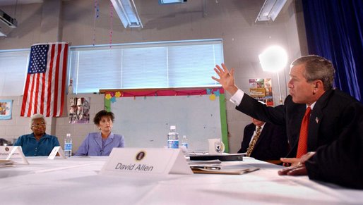 President George W. Bush participates in a roundtable discussion at Madison Central High School in Madison, Miss., Wednesday, Aug. 7. White House photo by Eric Draper.