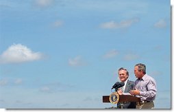 President George W. Bush and Secretary of Defense Donald Rumsfeld respond to questions from the press pool after their defense briefing at the Bush Ranch in Crawford, Texas, Wednesday, Aug. 21, 2002. White House photo by Eric Draper.