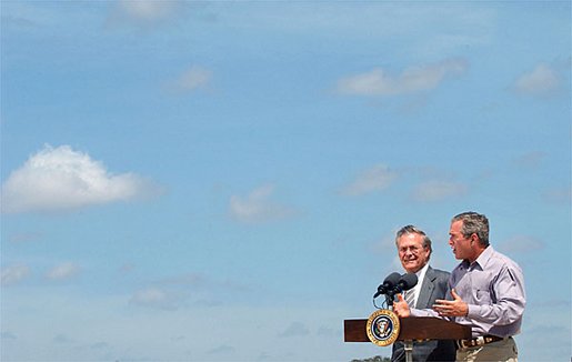 President George W. Bush and Secretary of Defense Donald Rumsfeld respond to questions from the press pool after their defense briefing at the Bush Ranch in Crawford, Texas, Wednesday, Aug. 21, 2002. White House photo by Eric Draper.