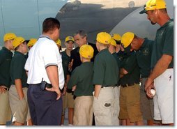 President George W. Bush greets players and coaches from the Valley Sports American Little League, this year’s Little League World Series Champions, upon arrival at Louisville International Stanford Field Airport in Kentucky Thursday, September 5, 2002. White House photo by Tina Hager.