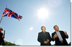 President George W. Bush answers questions from reporters following the arrival of British Prime Minister Tony Blair at Camp David, Saturday, Sept. 7, 2002. White House photo by Eric Draper.