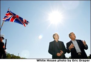 President George W. Bush answers questions from reporters following the arrival of British Prime Minister Tony Blair at Camp David, Saturday, Sept. 7, 2002. White House photo by Eric Draper. None