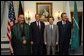 President George W. Bush poses for a group photo with, from left, President of Afghanistan Hamid Karzai, Japanese Prime Minister Junichiro Koizumi and Saudi Arabian Foreign Minister Prince Saud al-Faisal at the Waldorf-Astoria Hotel in New York City, Thursday, Sept. 12, 2002. The leaders announced a joint project to provide $180 million for road improvements in Afghanistan. White House photo by Eric Draper