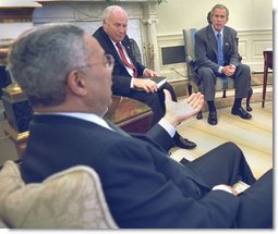 Secretary Colin Powell briefs President George W. Bush and Vice President Dick Cheney in the Oval Office, Thursday, Sept 19, on the progress of working with the United Nations, to convince the United Nations Security Council to deal with a threat to world peace. White House photo by Eric Draper.