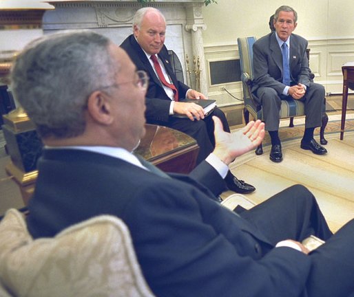 Secretary Colin Powell briefs President George W. Bush and Vice President Dick Cheney in the Oval Office, Thursday, Sept 19, on the progress of working with the United Nations, to convince the United Nations Security Council to deal with a threat to world peace. White House photo by Eric Draper.