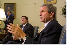 President George W. Bush and NATO Secretary General Lord Robertson hold a joint press conference in the Oval Office Monday, Oct. 21. White House photo by Paul Morse.