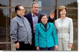 President George W. Bush and Mrs. Bush welcome Chinese President Jiang Zemin and his wife Wang Yeping to their home in Crawford, Texas, Oct. 25. White House photo by Tina Hager.