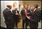 Vice President Dick Cheney talks with Rep. Steve Pearce, R-N.M., during a reception for the newly elected members of Congress in the State Dining Room at the White House Tuesday, Nov. 12. Also pictured are, from left to right, Rep. Jim Marshall, D-Ga., Sen. Thaddeus McCotter, R-Mich., and Sen. Norm Coleman, R-Minn. White House photo by David Bohrer.