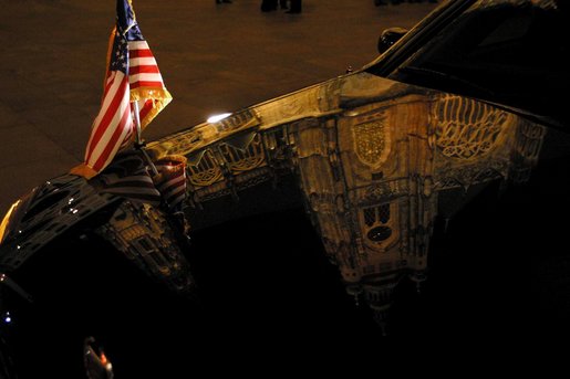 Prague Castle reflects in President George W. Bush's limousine in Prague, Czech Republic, Nov. 20. White House photo by Paul Morse