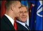 President George W. Bush looks toward Gedrimas "Jimmy" Jaglinskas before being introduced by the West Point Cadet at a speech to the Prague Atlantic Student Summit in Prague, Czech Republic, Wednesday, Nov. 20. White House photo by Paul Morse.