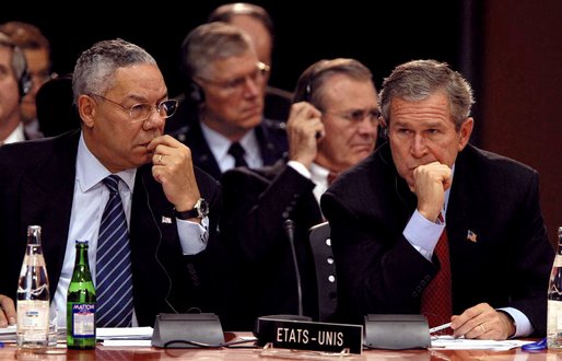 President George W. Bush and Secretary of State Colin Powell attend the North Atlantic Council Summit in Prague, Czech Republic, Thursday, Nov. 21. White House photo by Paul Morse.