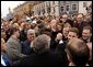 President George W. Bush greets Lithuanians in person at the Rotuse Square in the center of Vilnius, Lithuania, Nov. 23. "This is a great day in the history of Lithuania, in the history of the Baltics, in the history of NATO, and in the history of freedom," said President Bush in his remarks. "And I have the honor of sharing this message with you: We proudly invite Lithuania to join us in NATO, the great Atlantic Alliance." White House photo by Paul Morse