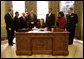 President George W. Bush signs the Maritime Transportation Security Act of 2002 in the Oval Office, Nov. 25, 2002. White House photo by Paul Morse.