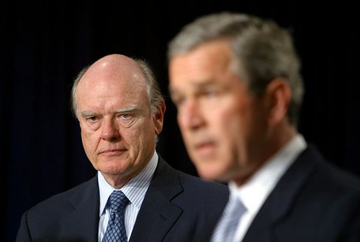 John Snow, who is nominated to be the Secretary of Treasury, listens to President George W. Bush's remarks in the Dwight D. Eisenhower Executive Office Building Monday, Dec. 9. "In a varied and productive career, John Snow has shown consistent qualities of foresight and integrity and public spirit. He's led one our nation's largest railroads with skill and success. He knows firsthand how the economy works. His peers elected him to lead the Business Roundtable, where he was an articulate voice for pro-growth policies," said the President. White House photo by Paul Morse.