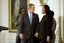 President George W. Bush congratulates Pamela Hedrick during a ceremony honoring graduates of welfare-to-work programs in the East Room. Ms. Hedrick was on public assistance for eight years in Columbus, Ohio, before volunteering at the Greenbriar Enrichment Center, where she organized a women's support group and received job training. The Presidents Council of Economic Advisers (CEA) estimates the Jobs and Growth plan will create 1.4 million new jobs by the end of 2004.  White House photo by Tina Hager