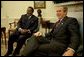 President George W. Bush and President Ismail Omar Guelleh of Djibouti greet the press during a meeting in the Oval Office Jan. 21, 2003. White House photo by Paul Morse