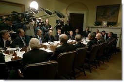 President George W. Bush addresses the press after meeting with economists in the Roosevelt Room Jan. 21, 2003. "We had a great discussion about the plan that I laid out for the Congress to consider and to enact, a plan which focuses on job creation, a plan which recognizes that money in the consumers' pocket will help grow this economy, a plan that recognizes there are some long-term things we can do to make sure the investor feels comfortable taking risks in America," said the President to the media.  White House photo by Paul Morse