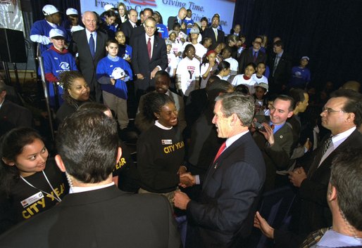 On the first anniversary of President George W. Bush's USA Freedom Corps initiative, the President visits the Jelleff Branch of the Boys & Girls Club of Greater Washington in the District of Columbia Thursday, Jan. 30. "Once again, I'm asking our fellow citizens to serve your community and to serve your country by finding a program that will make a difference in somebody's lives. It doesn't matter how big or small the program may sound. What matters is your love and your energy and your participation," said the President in his remarks. White House photo by Tina Hager.