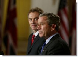 After meeting privately to discuss the situation in Iraq, President George W. Bush and British Prime Minister Tony Blair address the media in the Cross Hall Friday, Jan. 31, 2003. "I appreciate my friend's commitment to peace and security. I appreciate his vision. I appreciate his willingness to lead," said the President of Prime Minister Blair. "Most importantly, I appreciate his understanding that after September the 11th, 2001, the world changed; that we face a common enemy -- terrorists willing to kill innocent lives; that we now recognize that threats which gather in remote regions of the world must be dealt with before others lose their lives."  White House photo by Paul Morse