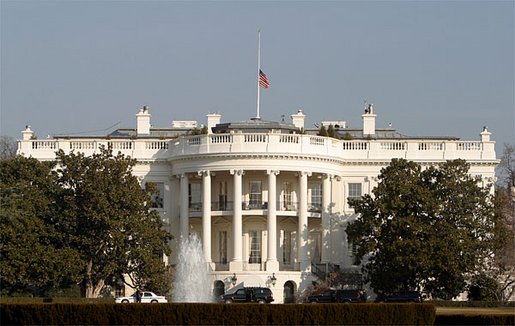 Honoring the seven astronauts who lost their lives aboard the Space Shuttle Columbia on Saturday, Feb. 1, 2003, the American flag continues to be flown at half-staff over the White House Monday, Feb. 3. President George W. Bush has directed the government to fly the flag at half-staff through Wednesday, Feb. 5. White House photo by Paul Morse.