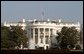 Honoring the seven astronauts who lost their lives aboard the Space Shuttle Columbia on Saturday, Feb. 1, 2003, the American flag continues to be flown at half-staff over the White House Monday, Feb. 3. President George W. Bush has directed the government to fly the flag at half-staff through Wednesday, Feb. 5. White House photo by Paul Morse