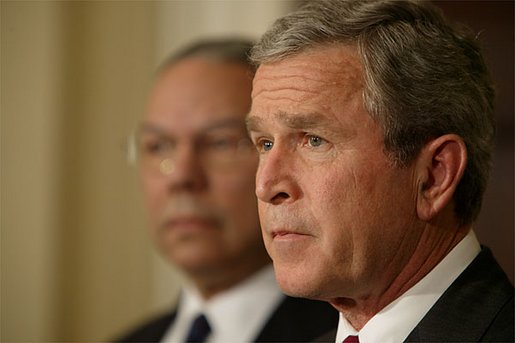 As Secretary of State Colin Powell stands by his side, President George W. Bush discusses Iraq's illegal weapons programs in the Roosevelt Room Thursday, Feb. 6, 2003. "The Iraqi regime has actively and secretly attempted to obtain equipment needed to produce chemical, biological and nuclear weapons. Firsthand witnesses have informed us that Iraq has at least seven mobile factories for the production of biological agents, equipment mounted on trucks and rails to evade discovery," said the President. White House photo by Paul Morse.