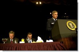 Led in prayer by the Chairman of the Joint Chiefs of Staff General Richard Myers, President George W. Bush and Congressman Ray LaHood (R-IL) pray during the National Prayer Breakfast in Washington, D.C., Thursday, Feb. 6, 2003. "In this hour of our country's history, we stand in the need of prayer. We pray for the families that have known recent loss. We pray for the men and women who serve around the world to defend our freedom," said the President in his remarks. "We pray for their families. We pray for wisdom to know and do what is right. And we pray for God's peace in the affairs of men."  White House photo by Eric Draper