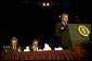 Led in prayer by the Chairman of the Joint Chiefs of Staff General Richard Myers, President George W. Bush and Congressman Ray LaHood (R-IL) pray during the National Prayer Breakfast in Washington, D.C., Thursday, Feb. 6, 2003. "In this hour of our country's history, we stand in the need of prayer. We pray for the families that have known recent loss. We pray for the men and women who serve around the world to defend our freedom," said the President in his remarks. "We pray for their families. We pray for wisdom to know and do what is right. And we pray for God's peace in the affairs of men." White House photo by Eric Draper.