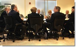 President George W. Bush meets with small investors at Charles Schwab and Company in Alexandria, Va., Wednesday, Feb. 12, 2003.   White House photo by Tina Hager