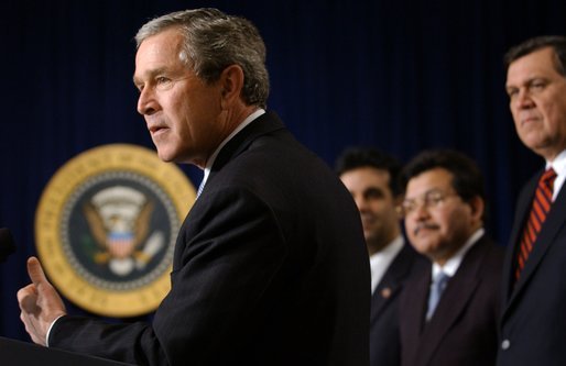 President George W. Bush speaks with The Latino Coalition in the Dwight D. Eisenhower Executive Office Building Wednesday, Feb. 26, 2003. Pictured with the President are Hector Barreto, Small Business Administration Administrator; Alberto Gonzales, Counsel to the President and Mel Martinez, Secretary of Housing and Urban Development. White House photo by Tina Hager