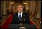 President George W. Bush addresses the nation from the Cross Hall at the White House Monday evening, March 17, 2003.  White House photo by Paul Morse