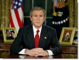 President George W. Bush addresses the nation from the Oval Office at the White House Wednesday evening, March 19, 2003.   White House photo by Paul Morse