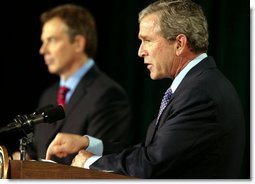 President George W. Bush and British Prime Minister Tony Blair conduct a joint news conference at Camp David concerning the war in Iraq Thursday, March 27, 2003.  White House photo by Paul Morse