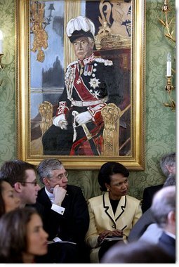 British Foreign Minister Jack Straw and National Security Advisor Dr. Condoleezza Rice listen to President George W. Bush and British Prime Minister Tony Blair during their joint press conference at Hillsborough Castle, near Belfast, Northern Ireland, Tuesday, April 8, 2003. White House photo by Paul Morse