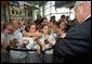 Vice President Dick Cheney shakes hands with students in New Orleans, La., after touring the National D-Day Museum with his wife Lynne Wednesday, April 9, 2003. White House photo by David Bohrer