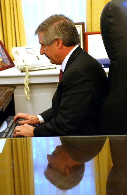 White House Chief of Staff Andrew Card answers questions during, "Ask the White House," an online interactive forum Wednesday, April 16, 2003. White House photo by Tina Hager.