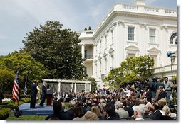 President George W. Bush welcomes the 2003 National and State Teachers of the Year during a ceremony in the East Garden Wednesday, April 30, 2003."I want to thank the teachers, who have traveled from all over the country, for being here today. Thank you for your dedication. Thank you for your hard and rewarding work. The 54 teachers we honor today deserve the respect and the gratitude of our entire nation. This is our way of thanking you all for your dedication, your service, and your love," President Bush said.  White House photo by Paul Morse