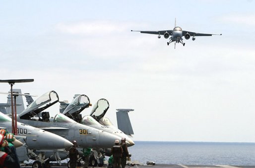 President George W. Bush approached the flight deck of the USS Abraham Lincoln in a S-3B Viking jet Thursday, May 1, 2003. White House photo by Paul Morse