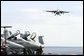 President George W. Bush approached the flight deck of the USS Abraham Lincoln in a S-3B Viking jet Thursday, May 1, 2003. White House photo by Paul Morse