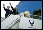 President George W. Bush and Prime Minister John Howard of Australia board Air Force One at Moffet Federal Airfield in Santa Clara, Calif., Friday, May 2, 2003. The Prime Minister is accompanying the President to his ranch in Crawford, Texas for the weekend. White House photo by Susan Sterner