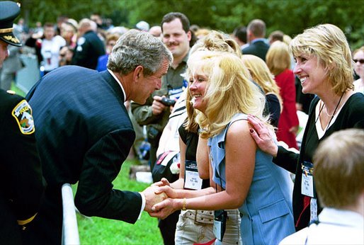 President George W. Bush greets attendees during the Annual Peace Officers' Memorial Service at the U.S. Capitol in Washington, D.C., Thursday, May 15, 2003. White House photo by Paul Morse.