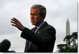 Departing the White House via Marine One, President George W. Bush talks with the media on the South Lawn Friday, May 16, 2003.  White House photo by Paul Morse